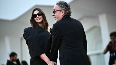 Italian actress Monica Bellucci and US director Tim Burton have parted ways. (AFP) Italian actress Monica Bellucci and US director Tim Burton have parted ways. (AFP)