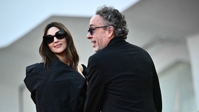 Italian actress Monica Bellucci and US director Tim Burton have parted ways. Here is all you need to know about Tim Burton's net worth. (AFP) Italian actress Monica Bellucci and US director Tim Burton have parted ways. Here is all you need to know about Tim Burton's net worth. (AFP)