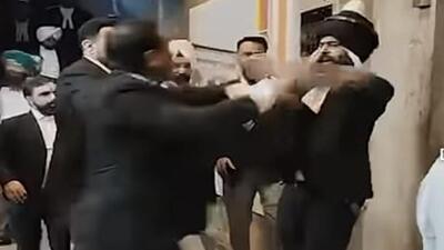 High drama was seen on Wednesday as the suspended lawyer Simranjit Singh Blassi, wearing a nihang attire underneath his suit, allegedly attacked and threatened lawyers with a sword, reportedly in support of lawyer Ravneet Kaur. (HT)