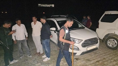 Police at the spot where accused Rahul Ghanghas and Rajiv Sandhu were arrested after a shootout in Kurukshetra on Thursday night. (HT Photo) Police at the spot where accused Rahul Ghanghas and Rajiv Sandhu were arrested after a shootout in Kurukshetra on Thursday night. (HT Photo)