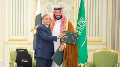 Saudi Crown Prince Mohammed bin Salman and Pakistan Prime Minister Shehbaz Sharif embrace each other on the day they sign a defence agreement, in Riyadh, Saudi Arabia, September 17, 2025. (via REUTERS)