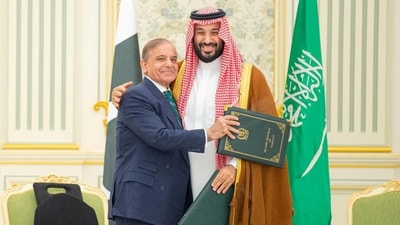 FILE PHOTO: Saudi Crown Prince Mohammed bin Salman and Pakistan Prime Minister Shehbaz Sharif embrace each other on the day they sign a defence agreement, in Riyadh, (via REUTERS)
