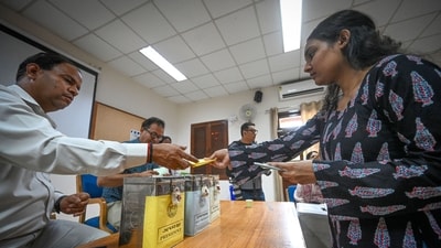 A student is seen to complete the formal procedures before casting her vote for the DUSU elections at Miranda House on Thursday. (Sanchit Khanna/Hindustan Times) A student is seen to complete the formal procedures before casting her vote for the DUSU elections at Miranda House on Thursday. (Sanchit Khanna/Hindustan Times)