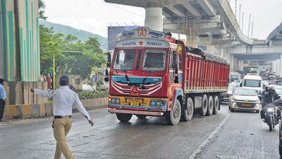 Thane, India - September -19, 2025:: After residents of Ghodbunder Road, distressed by frequent traffic jams, staged a protest on September 16, heavy vehicles were banned from entering the road during the daytime. Traffic police can be seen at Nagla Bandar enforcing this entry ban on heavy vehicles. ,in Thane ,in Mumbai, India, on, Friday, September -19, 2025. ( Praful Gangurde / HT Photo )