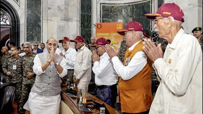 Union defence minister Rajnath Singh with veterans and families of fallen heroes of the 1965 war, at the South Block in New Delhi on Friday. (PIB) Union defence minister Rajnath Singh with veterans and families of fallen heroes of the 1965 war, at the South Block in New Delhi on Friday. (PIB)