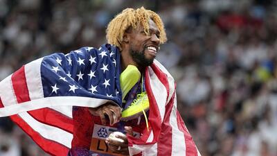 United States' Noah Lyles celebrates after winning the gold in the men's 200 meters final at the World Athletics Championships in Tokyo, Friday, Sept. 19, 2025. (AP Photo/Petr David Josek) (AP) United States' Noah Lyles celebrates after winning the gold in the men's 200 meters final at the World Athletics Championships in Tokyo, Friday, Sept. 19, 2025. (AP Photo/Petr David Josek) (AP)
