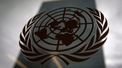 FILE PHOTO: The United Nations headquarters building is pictured though a window with the UN logo in the foreground in the Manhattan borough of New York August 15, 2014.    REUTERS/Carlo Allegri/File Photo (REUTERS)