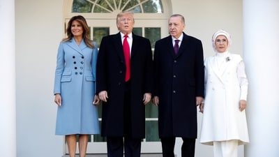US President Donald Trump and first lady Melania Trump stand with Turkey's President Tayyip Erdogan and Emine Erdogan at the White House in 2019 (REUTERS)