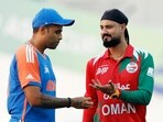 Indian captain Suryakumar Yadav and Oman's captain Jatinder Singh Indian captain Suryakumar Yadav and Oman's captain Jatinder Singh