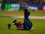 India's Axar Patel drops the catch of Oman's Hammad Mirza and hurt his head.