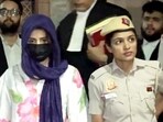 Gaganpreet Makkad in police custody. (PTI) Gaganpreet Makkad in police custody. (PTI)