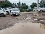 Heavy rains in recent days have severely damaged many roads, leading to large potholes. (HT File)