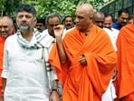 Karnataka Deputy Chief Minister DK Shivakumar, Nirmalanandanatha Mahaswamiji, head of Sri Adichunchanagiri Mahasamsthana Math, and others during a 'Vokkaliga' community meeting on caste census, in Bengaluru onSaturday. (PTI) Karnataka Deputy Chief Minister DK Shivakumar, Nirmalanandanatha Mahaswamiji, head of Sri Adichunchanagiri Mahasamsthana Math, and others during a 'Vokkaliga' community meeting on caste census, in Bengaluru onSaturday. (PTI)