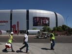 The man said he was providing private security at the stadium, where Charlie Kirk's memorial will take place on Sunday. The man said he was providing private security at the stadium, where Charlie Kirk's memorial will take place on Sunday.