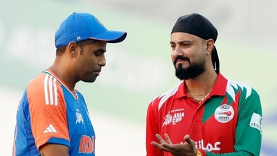 Indian captain Suryakumar Yadav and Oman's captain Jatinder Singh (ANI) Indian captain Suryakumar Yadav and Oman's captain Jatinder Singh (ANI)