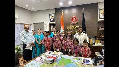 Children from slum areas studying at schools run by NGO Nobel Foundation handing over ₹1,01,000 to deputy commissioner Himanshu Jain in Ludhiana on Friday. (HT Photo) Children from slum areas studying at schools run by NGO Nobel Foundation handing over ₹1,01,000 to deputy commissioner Himanshu Jain in Ludhiana on Friday. (HT Photo)