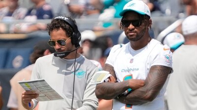Miami Dolphins head coach Mike McDaniels with quarterback Tua Tagovailoa. (IMAGN IMAGES via Reuters Connect)