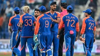 India's players shake hands with each other at the end of the Asia Cup match against Oman on Friday. (AFP) India's players shake hands with each other at the end of the Asia Cup match against Oman on Friday. (AFP)