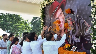 People pay tribute to singer Zubeen Garg a day after he died while scuba diving in Singapore, in Guwahati, Saturday. (PTI) People pay tribute to singer Zubeen Garg a day after he died while scuba diving in Singapore, in Guwahati, Saturday. (PTI)