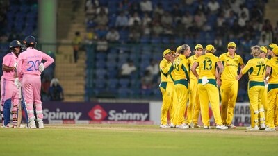 Australia's Ashleigh Gardner and others wait for the third umpire's decision over a DRS review for the wicket of India's Arundhati Reddy. (PTI) Australia's Ashleigh Gardner and others wait for the third umpire's decision over a DRS review for the wicket of India's Arundhati Reddy. (PTI)