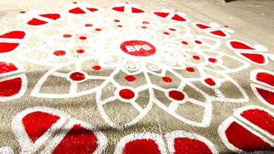 The artwork, measuring nearly 15 feet in diameter, was created between midnight and 3am on Friday night The artwork, measuring nearly 15 feet in diameter, was created between midnight and 3am on Friday night