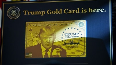 A Trump Gold Card sign in the Oval Office of the White House in Washington, DC, US, on Friday, Sept. 19, 2025. (Bloomberg) A Trump Gold Card sign in the Oval Office of the White House in Washington, DC, US, on Friday, Sept. 19, 2025. (Bloomberg)