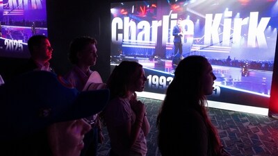 Young people watch a tribute for slain conservative activist Charlie Kirk during the Texas Youth Summit in Houston, Texas, U.S., September 19, 2025.   REUTERS/Antranik Tavitian (REUTERS)