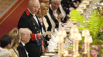 U.S. President Donald Trump listens as Britain's King Charles speaks during the state banquet at Windsor Castle, Berkshire, on day one of US President Donald Trump and First Lady Melania Trump's second state visit to the UK, Wednesday September 17, 2025.    Aaron Chown/Pool via REUTERS (via REUTERS)