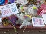 Flowers and signs at a memorial outside of Turning Point USA headquarters in Phoenix, Arizona, US, on Saturday, Sept. 20, 2025.&nbsp;