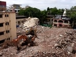 One month after the Bombay High Court ordered the demolition of two dangerously dilapidated buildings in Vasai (West), the Vasai Virar Municipal Corporation (VVMC) has started razing Pushpanjali and Deepanjali CHS to pave the way for redevelopment. The photo shows bulldozers tearing down the structures.