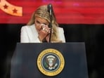 Erika Kirk wipes tears from her eyes before speaking at a memorial for her late husband conservative activist Charlie Kirk Erika Kirk wipes tears from her eyes before speaking at a memorial for her late husband conservative activist Charlie Kirk