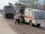 Repair work underway on Airport Road in Mohali. (HT Photo) Repair work underway on Airport Road in Mohali. (HT Photo)