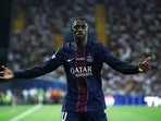 Paris Saint Germain's Ousmane Dembele reacts during a match.