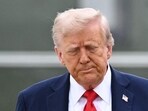 US President Donald Trump makes his way to board Air Force One before departing from Joint Base Andrews in Maryland on September 21, 2025, heading to Glendale, Arizona, to attend the public memorial service for Charlie Kirk.