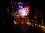 People light candles to pay tribute to singer Zubeen Garg in Guwahati on Saturday.