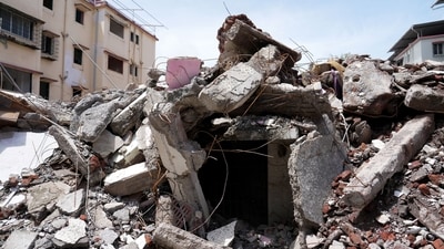 In August 2025, the Bombay High Court directed members of the two societies opposing redevelopment to vacate their premises. The court ruled that once a building is declared unsafe, residents cannot stop the municipal corporation from proceeding with demolition, nor can a minority block redevelopment decisions endorsed by the majority. The photo shows demolition work underway at the site. (Deepak Turbhekar ) In August 2025, the Bombay High Court directed members of the two societies opposing redevelopment to vacate their premises. The court ruled that once a building is declared unsafe, residents cannot stop the municipal corporation from proceeding with demolition, nor can a minority block redevelopment decisions endorsed by the majority. The photo shows demolition work underway at the site. (Deepak Turbhekar )