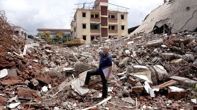 The two housing societies, comprising four buildings with 112 members, had already seen 101 residents vacate their flats after the majority appointed a developer for redevelopment. However, 11 members opposed the project and refused to move out, residents told HT.com. The building visible in the photo is the second structure of Deepanjali CHS slated for demolition in the coming days, alongside debris from the portions of both buildings demolished over the past week. (Deepak Turbhekar ) The two housing societies, comprising four buildings with 112 members, had already seen 101 residents vacate their flats after the majority appointed a developer for redevelopment. However, 11 members opposed the project and refused to move out, residents told HT.com. The building visible in the photo is the second structure of Deepanjali CHS slated for demolition in the coming days, alongside debris from the portions of both buildings demolished over the past week. (Deepak Turbhekar )