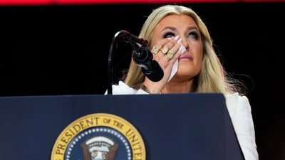 Erika Kirk wipes tears as she speaks at a memorial for her husband, conservative activist Charlie Kirk. (AP) Erika Kirk wipes tears as she speaks at a memorial for her husband, conservative activist Charlie Kirk. (AP)
