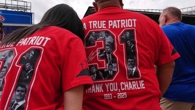 People wear shirts for Charlie Kirk outside before a memorial for the conservative activist Sunday, Sept. 21, 2025, at State Farm Stadium in Glendale, Ariz. (AP Photo/Jae C. Hong) (AP) People wear shirts for Charlie Kirk outside before a memorial for the conservative activist Sunday, Sept. 21, 2025, at State Farm Stadium in Glendale, Ariz. (AP Photo/Jae C. Hong) (AP)