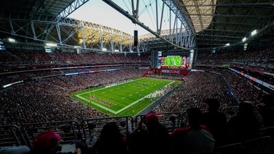 Spectators attend an NFL football game at State Farm Stadium in Glendale, Ariz. (AP)