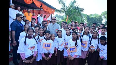 Deputy CM Brajesh Pathak with kids during Namo Yuva Run in Bareilly on Sunday. (HT PHOTO) Deputy CM Brajesh Pathak with kids during Namo Yuva Run in Bareilly on Sunday. (HT PHOTO)
