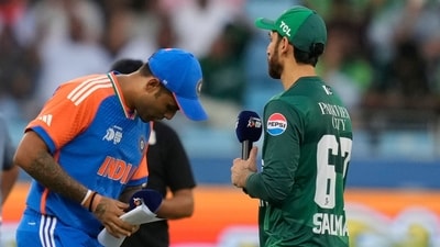 As expected this time, no handshake at the toss between the two captains, who in fact ignored each other altogether on this occasion. Suryakumar Yadav won the toss and chose to bowl first. (AP) As expected this time, no handshake at the toss between the two captains, who in fact ignored each other altogether on this occasion. Suryakumar Yadav won the toss and chose to bowl first. (AP)