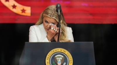 Erika Kirk wipes tears from her eyes before speaking at a memorial for her late husband conservative activist Charlie Kirk (AP) Erika Kirk wipes tears from her eyes before speaking at a memorial for her late husband conservative activist Charlie Kirk (AP)
