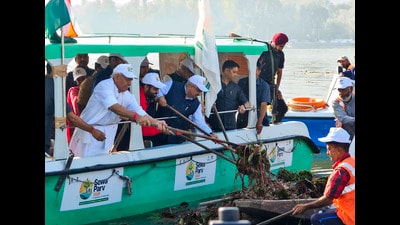 J&K LG Manoj Sinha takes part in 'Dal Lake Cleanliness Drive' in Srinagar, on Sunday. (PTI) J&K LG Manoj Sinha takes part in 'Dal Lake Cleanliness Drive' in Srinagar, on Sunday. (PTI)