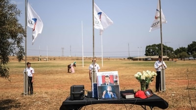 Young residents of Kleinfontein hoist their flags to fly at half-mast in honour of US youth activist and influencer Charlie Kirk in Kleinfontein, an Afrikaner settlement near Pretoria, on September 21, 2025. (AFP) Young residents of Kleinfontein hoist their flags to fly at half-mast in honour of US youth activist and influencer Charlie Kirk in Kleinfontein, an Afrikaner settlement near Pretoria, on September 21, 2025. (AFP)