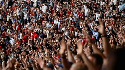 People sing pray songs as they gather to attend a memorial service for slain conservative commentator Charlie Kirk at State Farm Stadium, in Glendale, Arizona, U.S., September 21, 2025. REUTERS/Caitlin O'Hara (REUTERS)