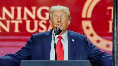 US President Donald Trump speaks onstage during a memorial service for slain conservative commentator Charlie Kirk at State Farm Stadium. (REUTERS)