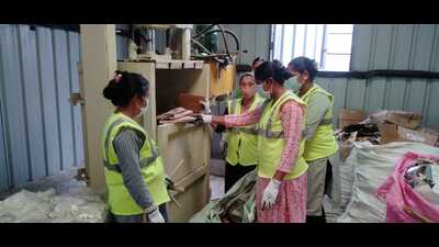 Under this initiative, household waste is collected daily from 428 households in Dapodi; carefully segregated into wet and dry waste; and processed using advanced equipment such as dust separators, agglomerators, hydraulic presses, and semi-automatic composting machines into nutrient-rich compost for the benefit of farmers. (HT PHOTO) Under this initiative, household waste is collected daily from 428 households in Dapodi; carefully segregated into wet and dry waste; and processed using advanced equipment such as dust separators, agglomerators, hydraulic presses, and semi-automatic composting machines into nutrient-rich compost for the benefit of farmers. (HT PHOTO)