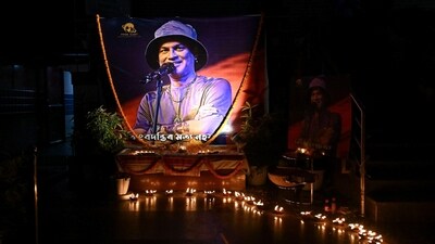 People light candles to pay tribute to singer Zubeen Garg in Guwahati on Saturday. (ANI) People light candles to pay tribute to singer Zubeen Garg in Guwahati on Saturday. (ANI)