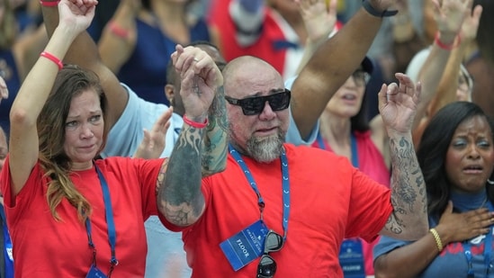Supporters attend a memorial for Charlie Kirk, Sunday, Sept. 21, 2025, at State Farm Stadium in Glendale, Ariz. (AP Photo/Ross D. Franklin)(AP)